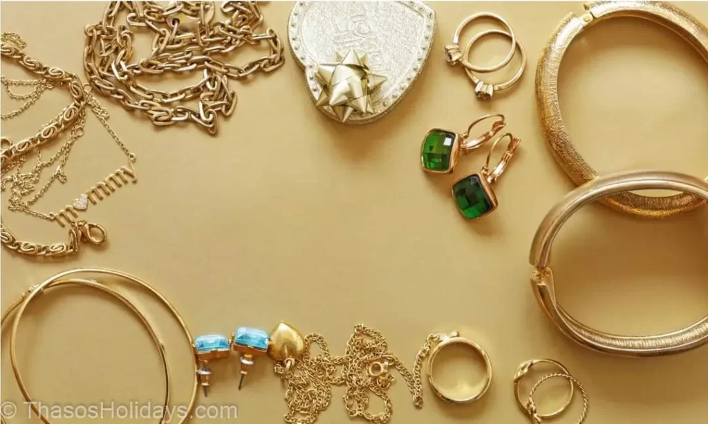 Jewlery lying on a golden color table