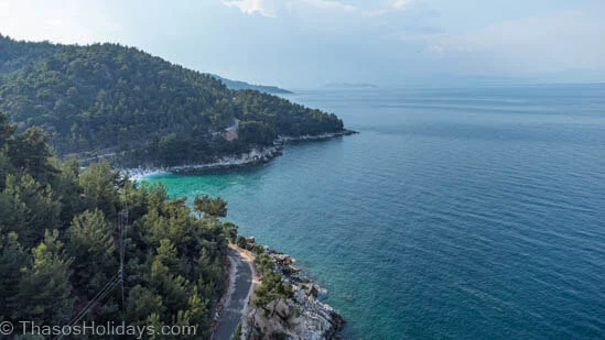 You can swim from Porto Vathy to Marble Beach or vice versa